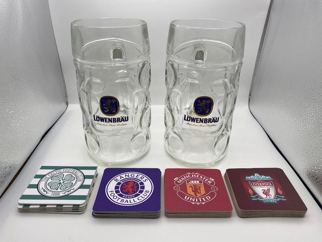 2 x litre spaten/lowenbrau litre steins and 5 free beer mats